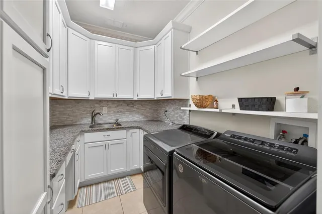 a bathroom with a sink toilet and mirror