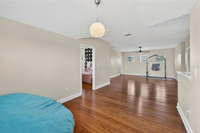 an aerial view of residential house with swimming pool and outdoor space