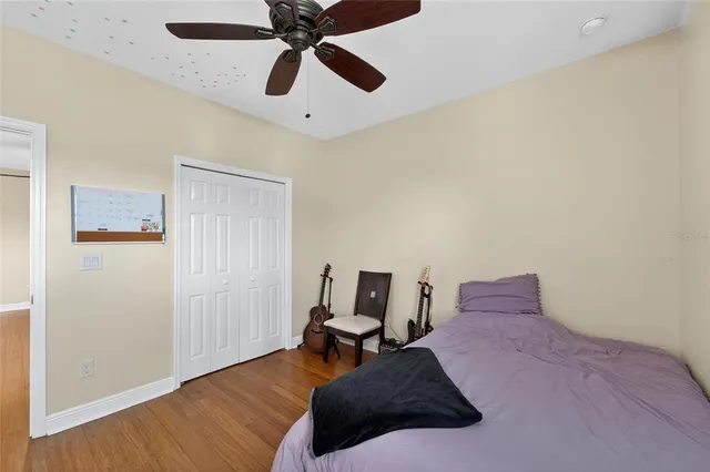 an aerial view of house with yard swimming pool and outdoor seating
