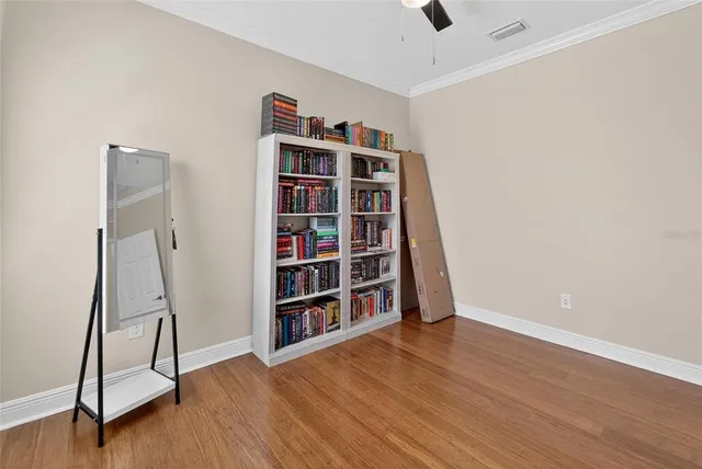 an aerial view of a house with outdoor space
