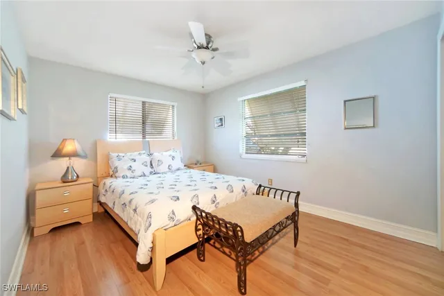 a bedroom with a bed and a table