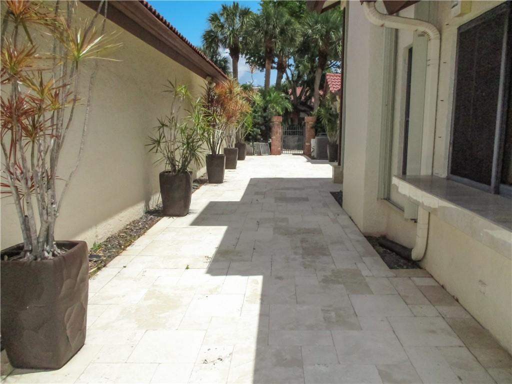 21723 Club Villa Terrace Boca Raton, FL 33433 - Photo 12 of 32 a view of a backyard of the house