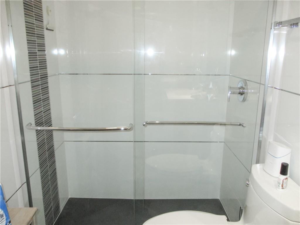 21723 Club Villa Terrace Boca Raton, FL 33433 - Photo 21 of 32 a bathroom with a shower and toilet