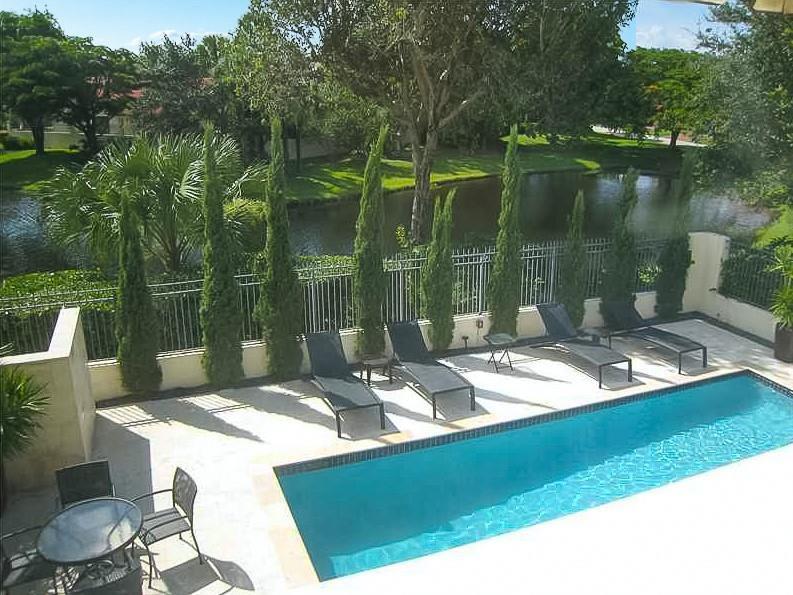 21723 Club Villa Terrace Boca Raton, FL 33433 - Photo 30 of 32 a view of a two chairs in the patio