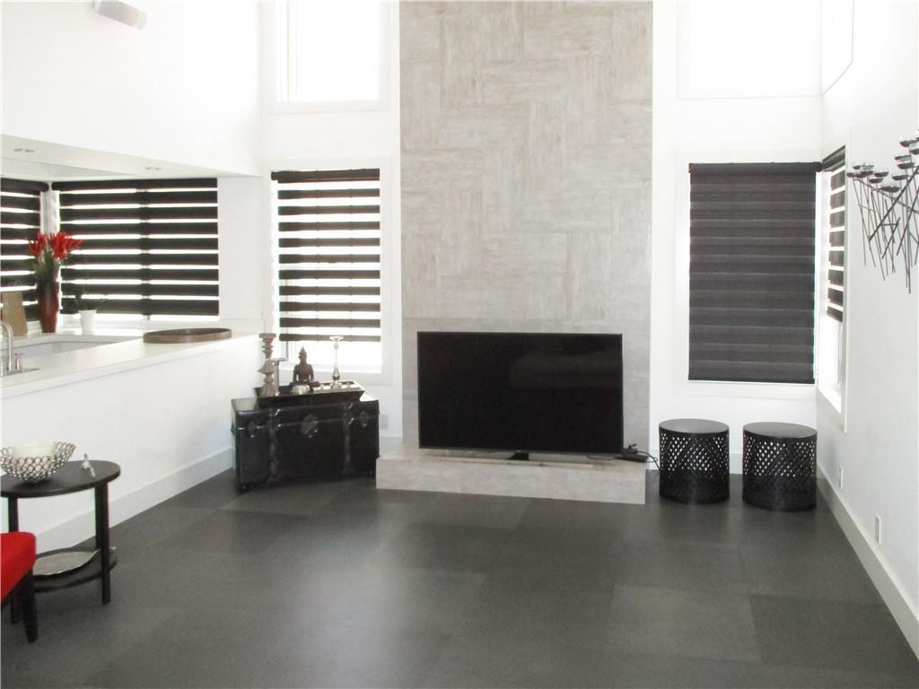 21723 Club Villa Terrace Boca Raton, FL 33433 - Photo 8 of 32 a living room with furniture a window and a fireplace
