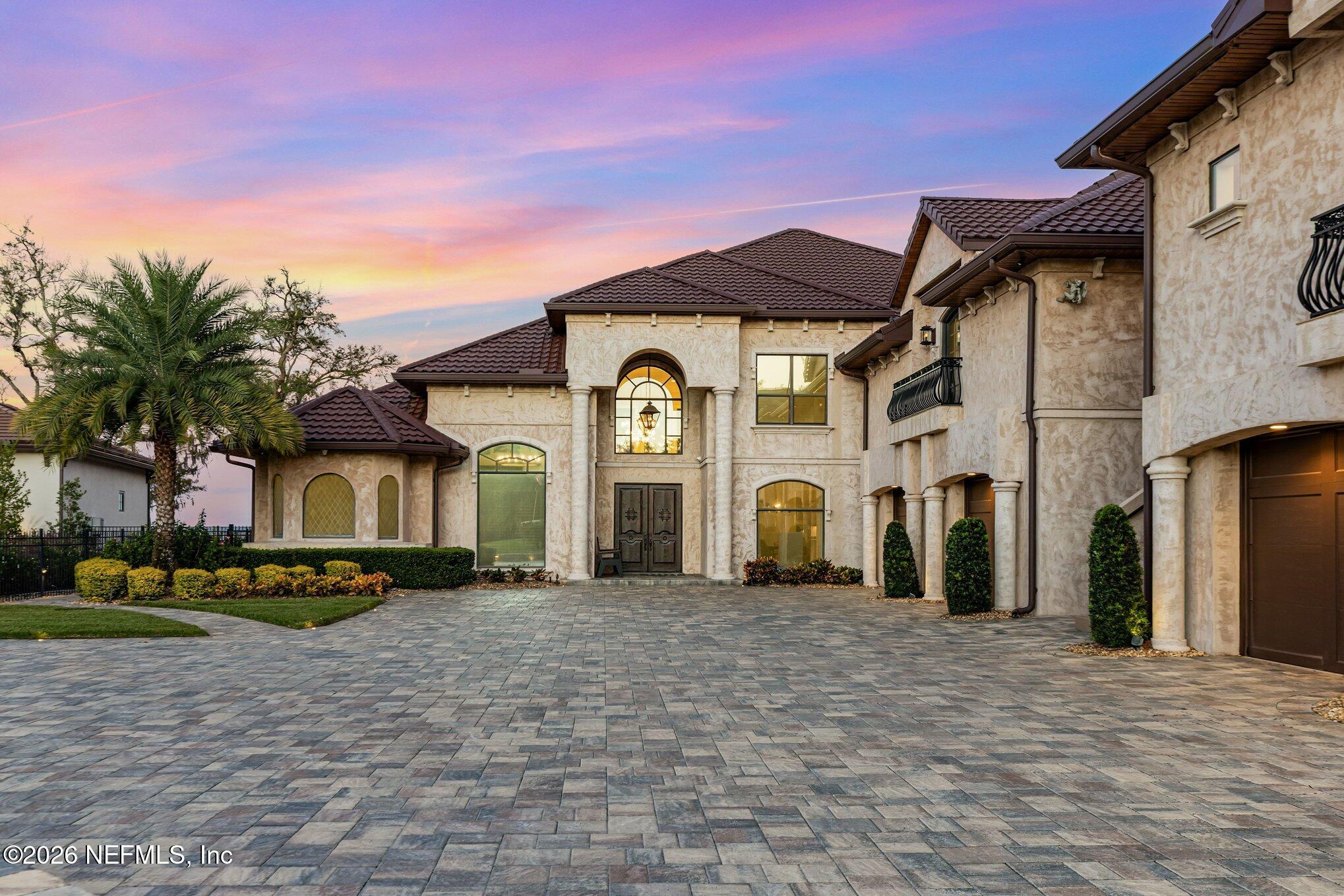 1402 Wilkies Point Road Green Cove Springs, FL 32043 - Photo 1 of 95 a front view of a house with a yard