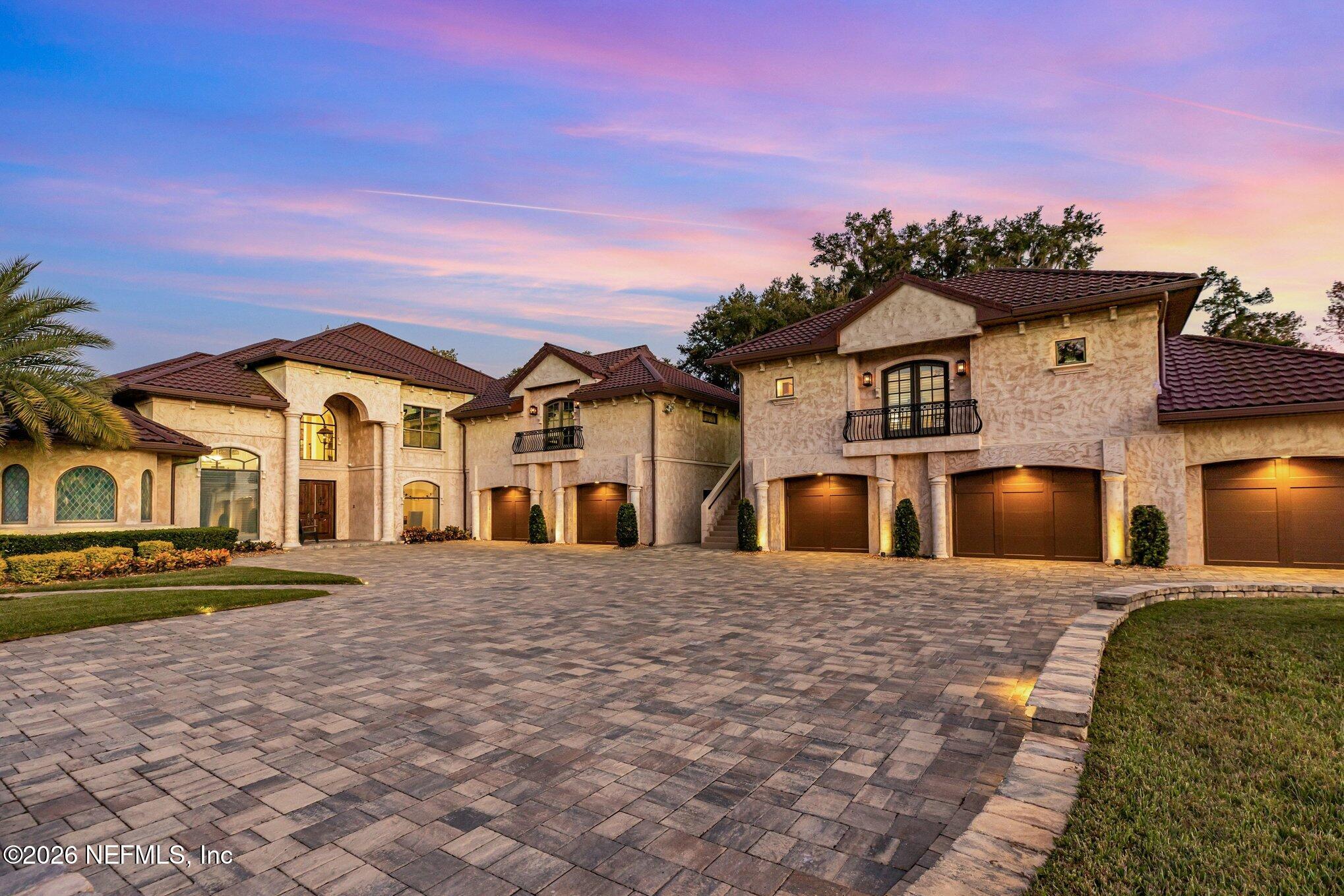 1402 Wilkies Point Road Green Cove Springs, FL 32043 - Photo 12 of 95 a front view of a house with a yard