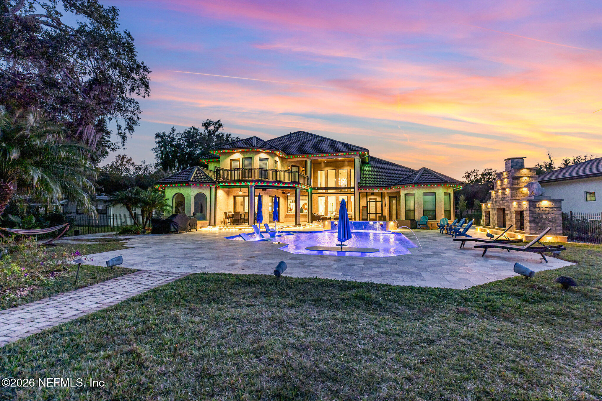 1402 Wilkies Point Road Green Cove Springs, FL 32043 - Photo 19 of 95 a view of a house with a yard and sitting area