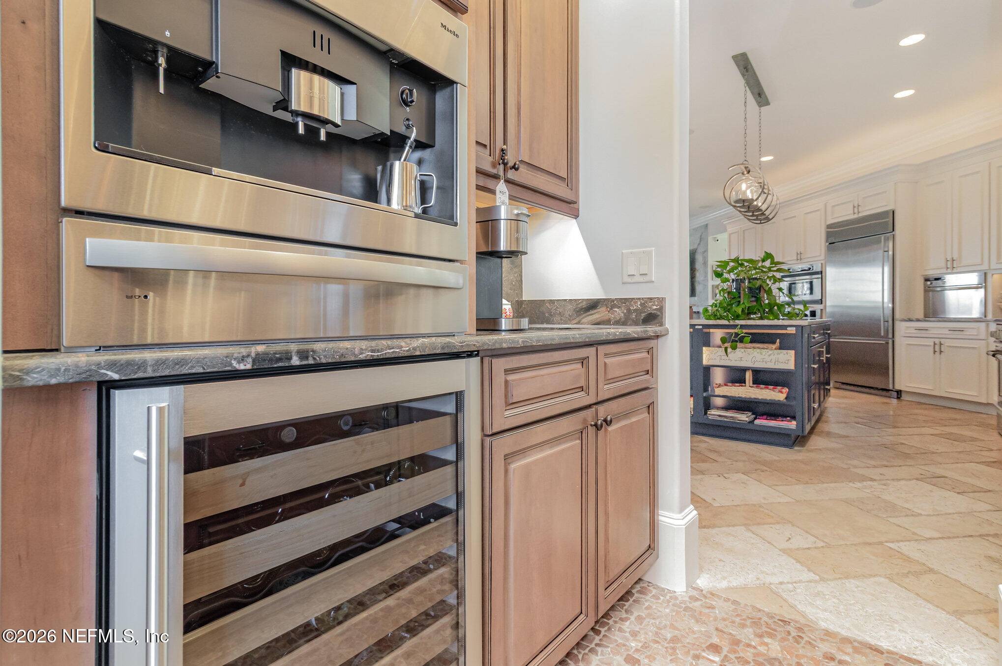 1402 Wilkies Point Road Green Cove Springs, FL 32043 - Photo 36 of 95 a kitchen with stainless steel appliances granite countertop a refrigerator and a stove