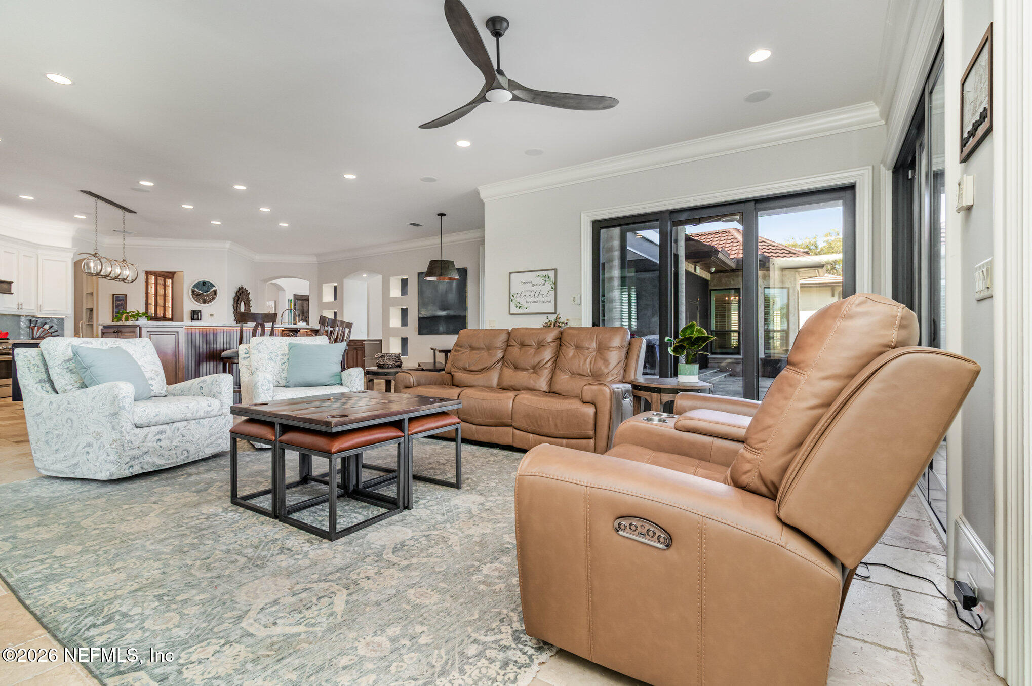 1402 Wilkies Point Road Green Cove Springs, FL 32043 - Photo 42 of 95 a living room with furniture and a large window