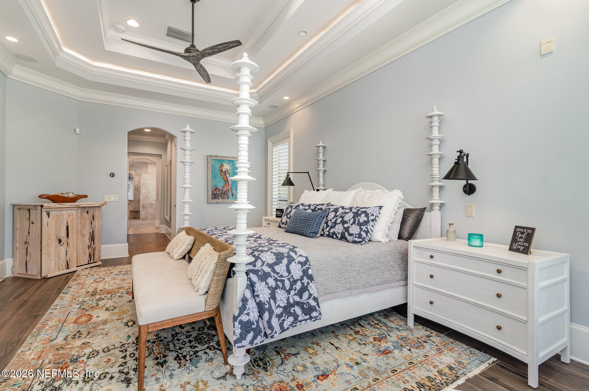 1402 Wilkies Point Road Green Cove Springs, FL 32043 - Photo 46 of 95 a bedroom with furniture and wooden floor