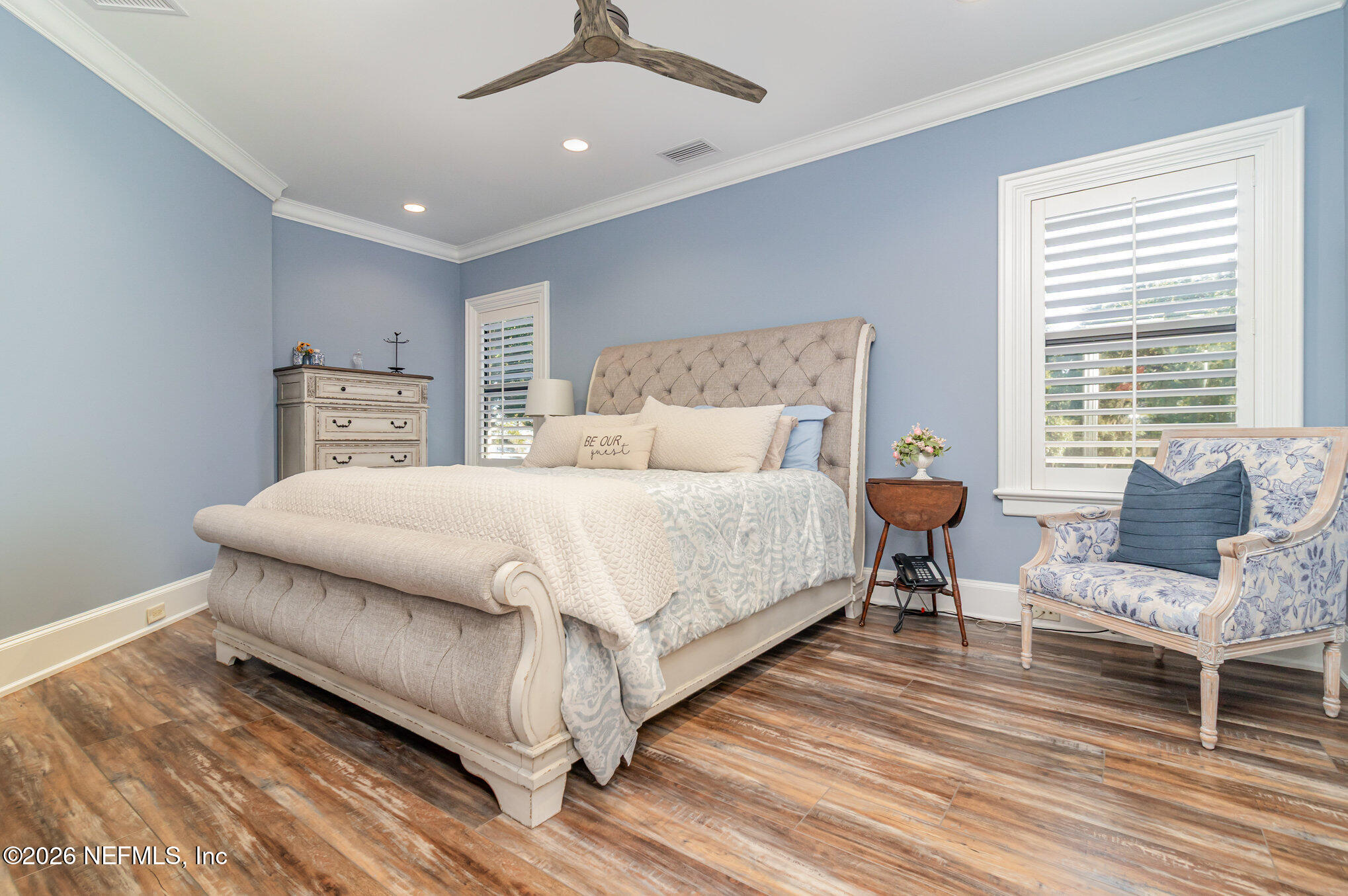 1402 Wilkies Point Road Green Cove Springs, FL 32043 - Photo 53 of 95 a bedroom with a bed and wooden floor