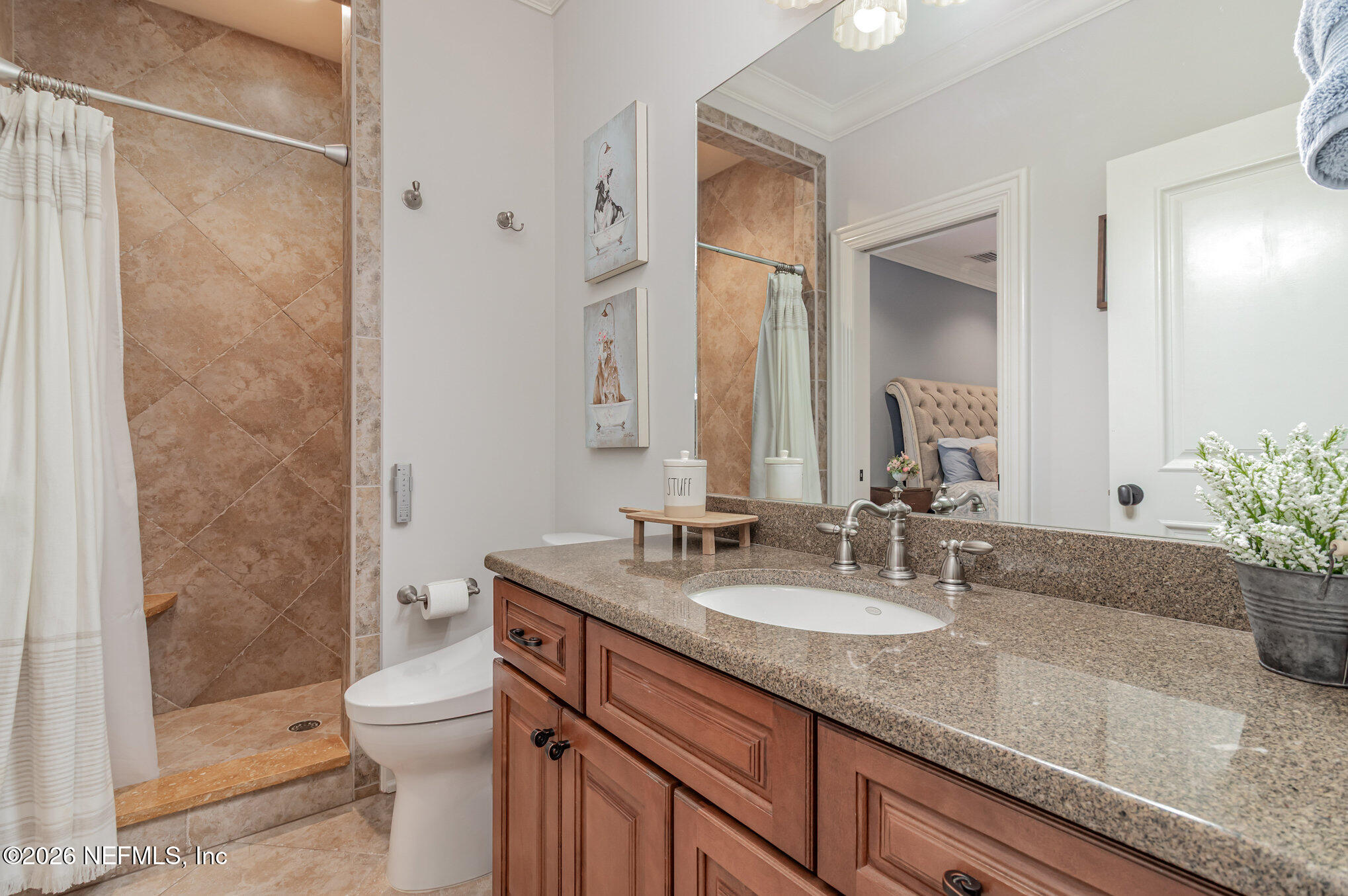 1402 Wilkies Point Road Green Cove Springs, FL 32043 - Photo 54 of 95 a bathroom with a granite countertop sink a toilet and shower