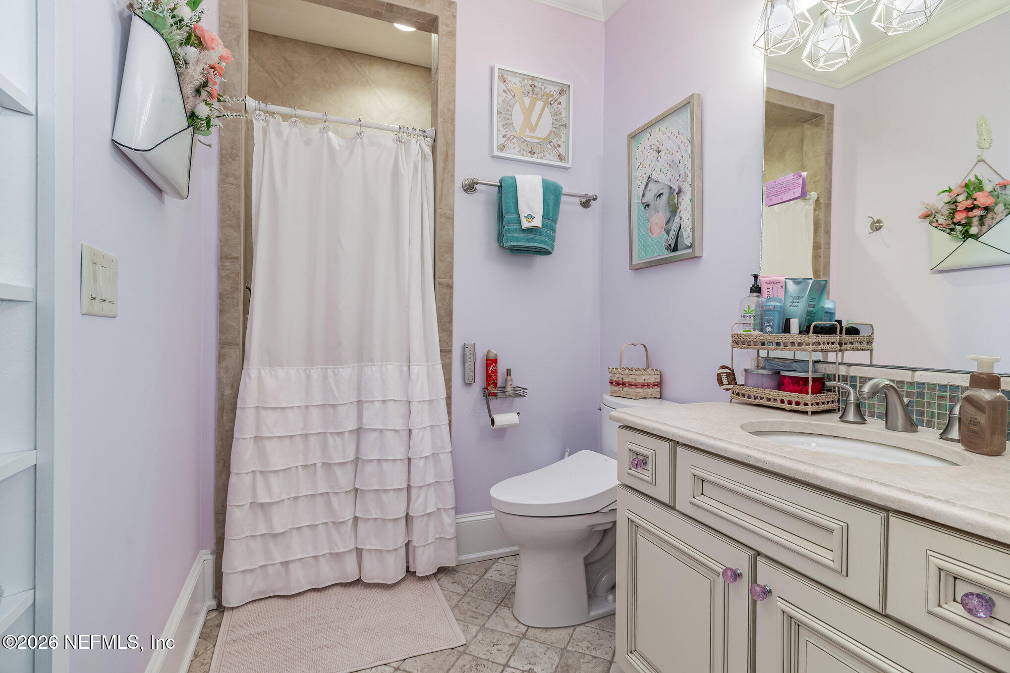 1402 Wilkies Point Road Green Cove Springs, FL 32043 - Photo 60 of 95 a bathroom with a sink toilet and shower