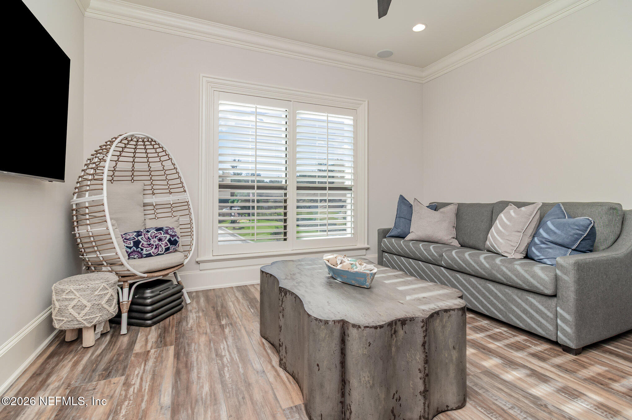 1402 Wilkies Point Road Green Cove Springs, FL 32043 - Photo 63 of 95 a living room with furniture and a large window
