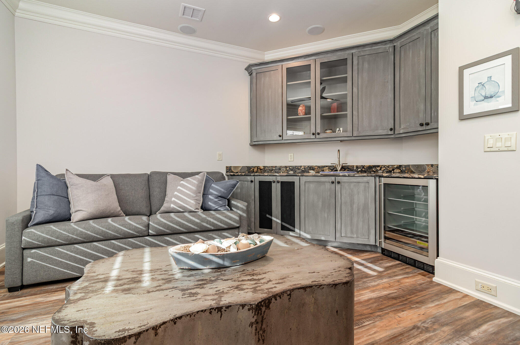 1402 Wilkies Point Road Green Cove Springs, FL 32043 - Photo 64 of 95 a living room with a couch and a stove top oven