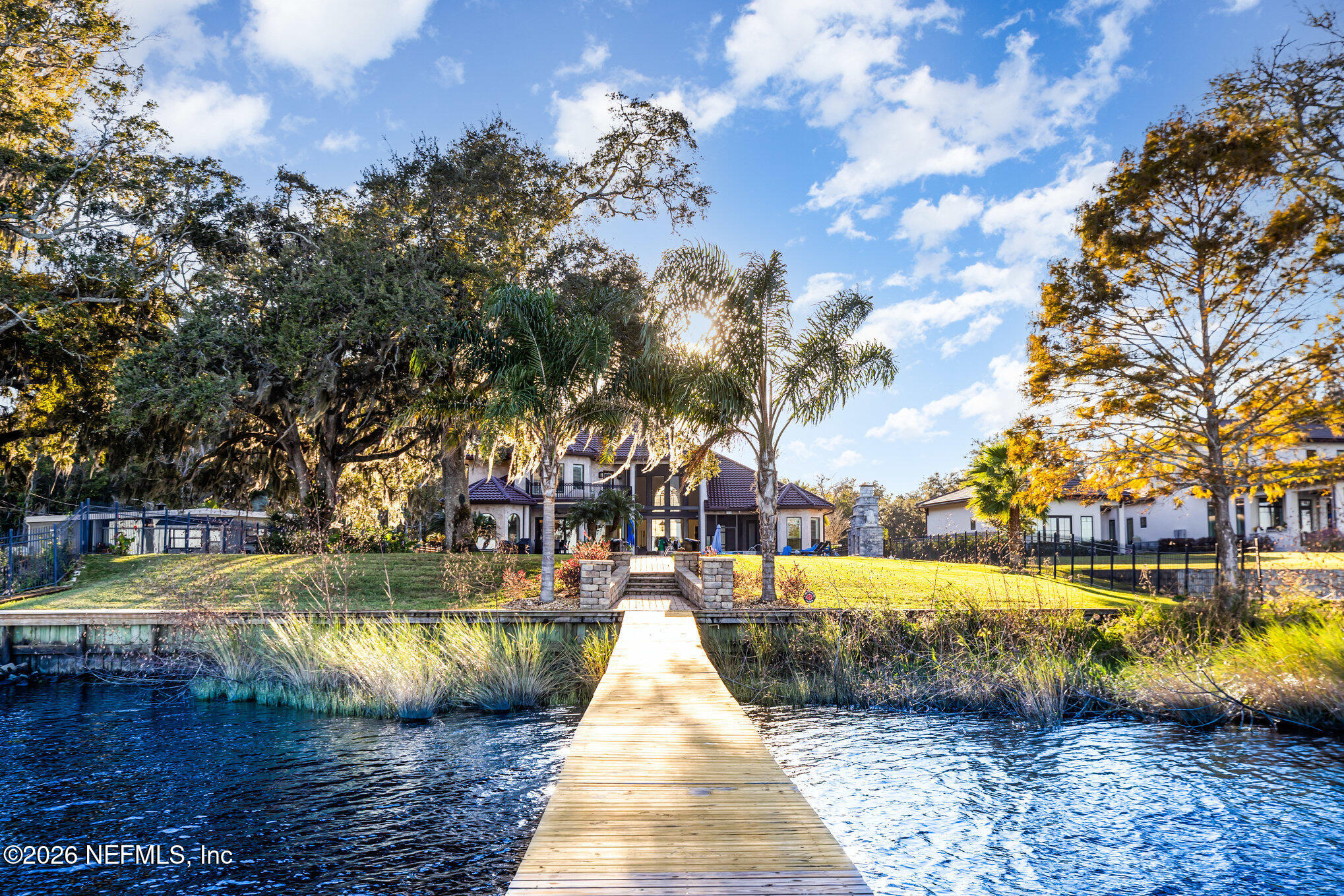 1402 Wilkies Point Road Green Cove Springs, FL 32043 - Photo 79 of 95 a view of swimming pool with sitting area and garden