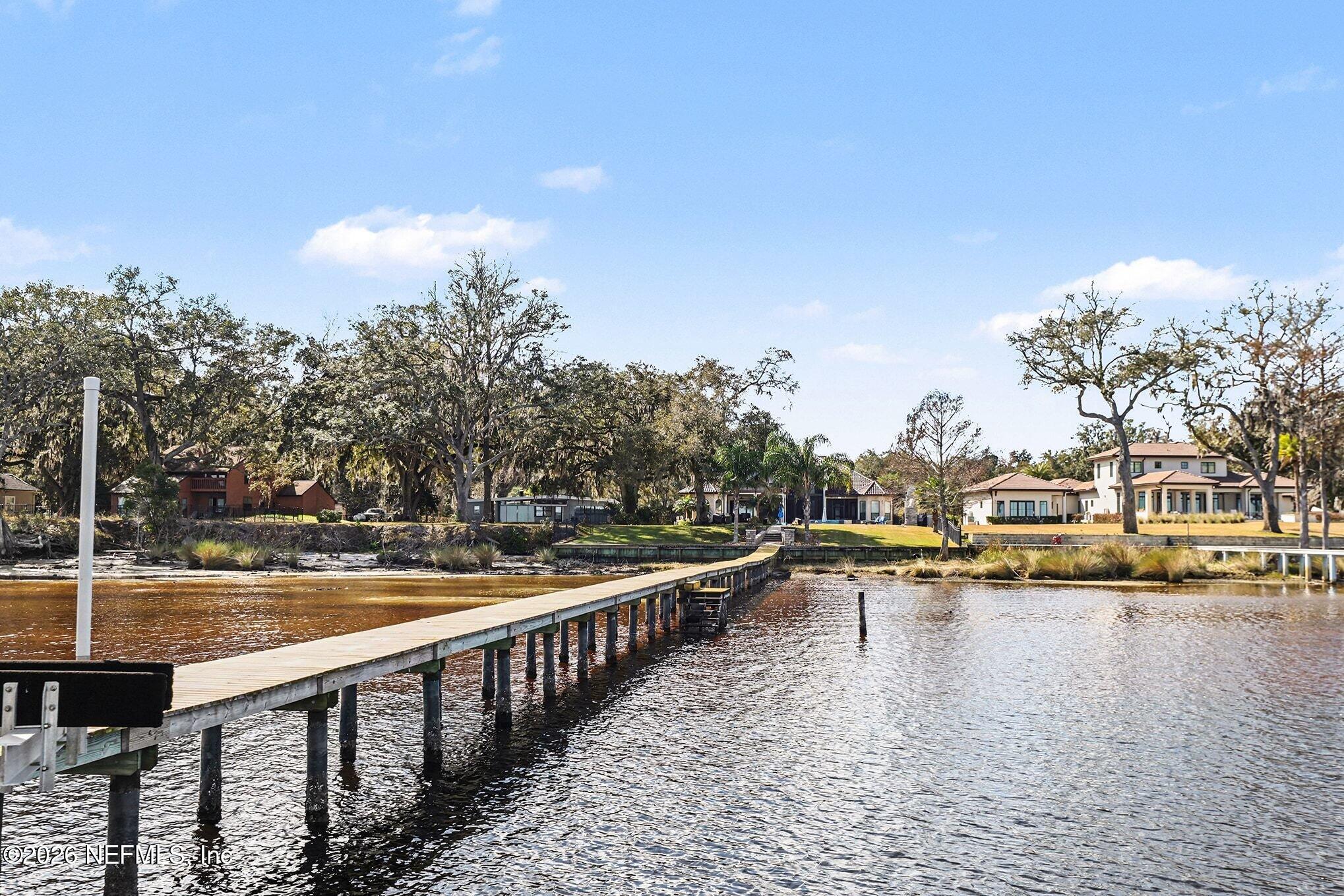 1402 Wilkies Point Road Green Cove Springs, FL 32043 - Photo 83 of 95 a view of residential houses with outdoor space and lake view