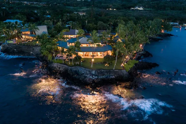a view of a yard with an ocean view