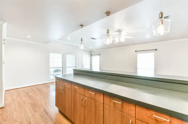 a stove top oven sitting inside of a kitchen