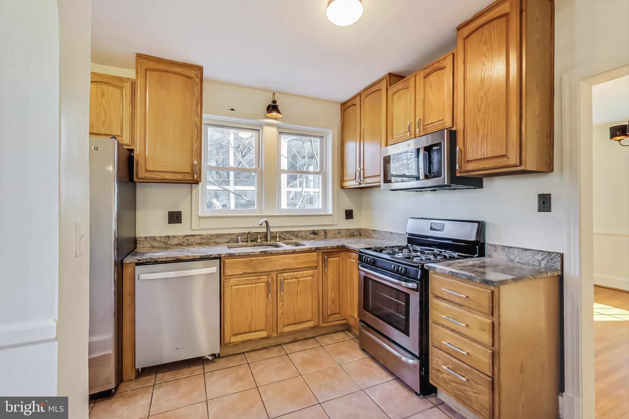 1355 Kalmia Road Northwest Washington, DC 20012 - Photo 7 of 41 Tall cabinets and SS appliances