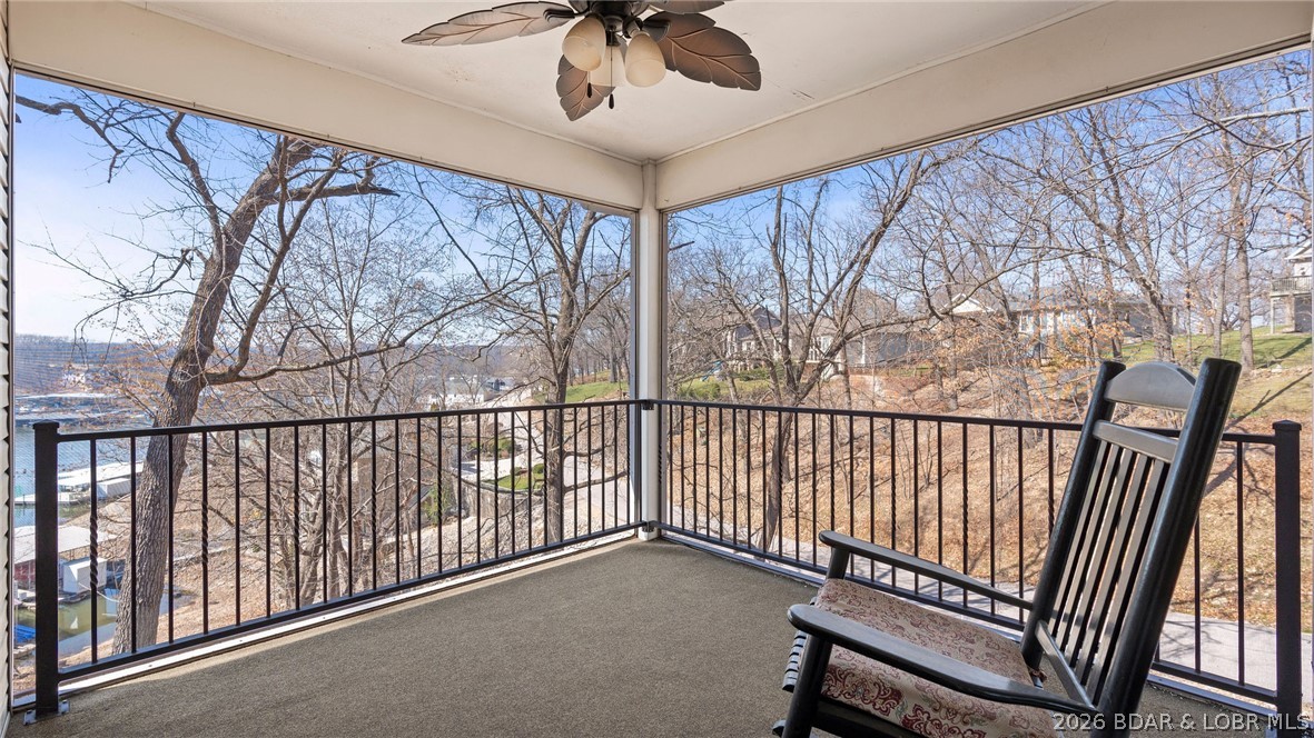 1500 Swiss Village Road Osage Beach, MO 65065 - Photo 13 of 83 Walkout deck off of kitchen. Screened in