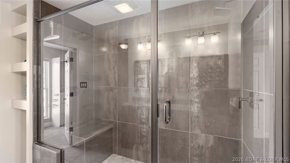 1500 Swiss Village Road Osage Beach, MO 65065 - Photo 26 of 83 Walk in Shower.