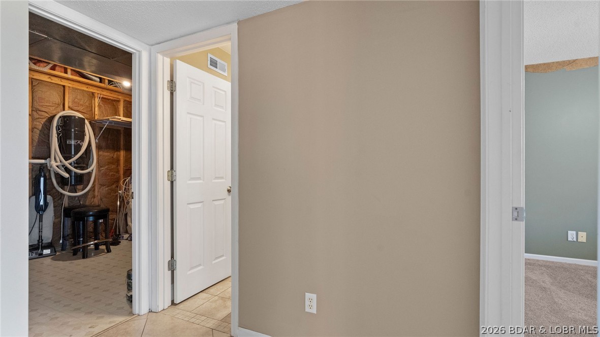 1500 Swiss Village Road Osage Beach, MO 65065 - Photo 36 of 83 Lower Level Utility Room