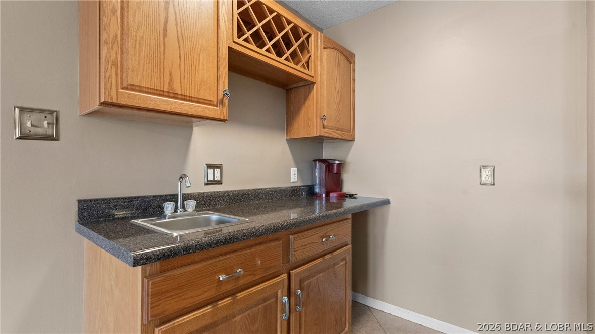 1500 Swiss Village Road Osage Beach, MO 65065 - Photo 41 of 83 Wet Bar Lower Level