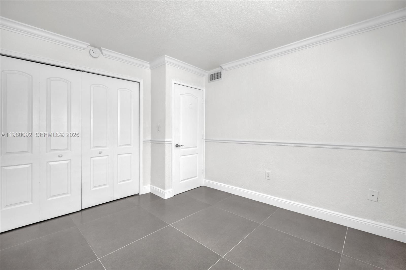 3245 Virginia Street, Unit 26 Miami, FL 33133 - Photo 9 of 26 a view of an empty room