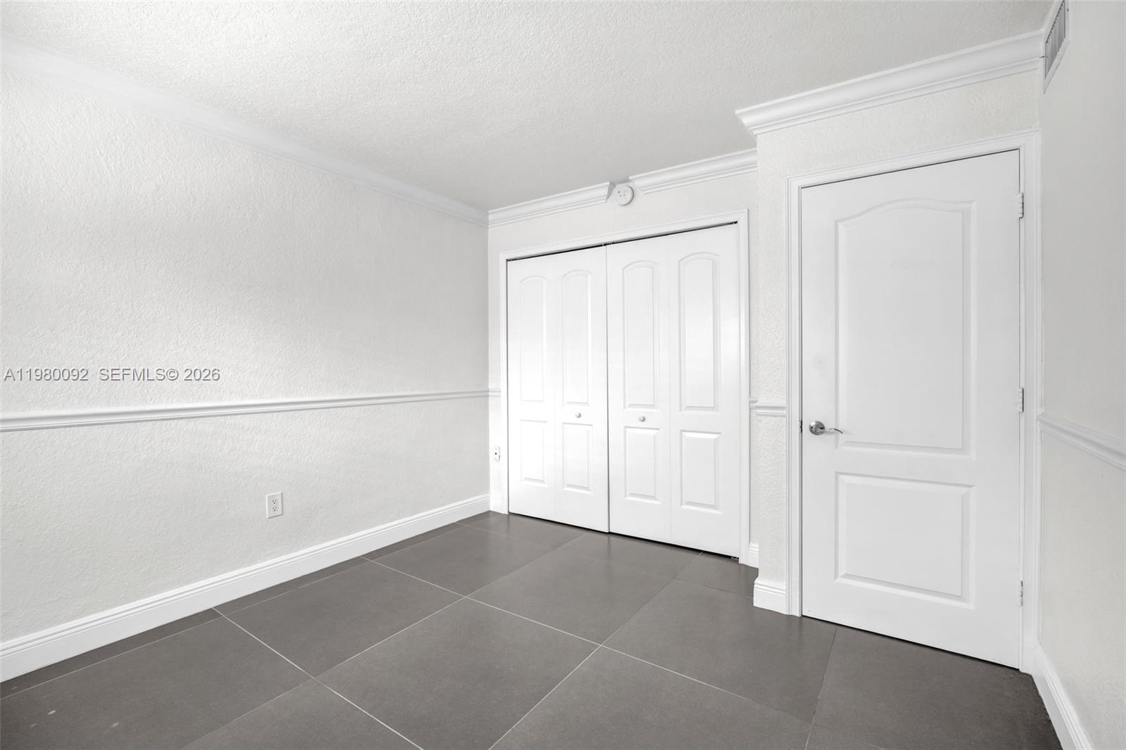 3245 Virginia Street, Unit 26 Miami, FL 33133 - Photo 10 of 26 a view of an empty room