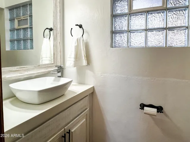 a view of a building with sitting area