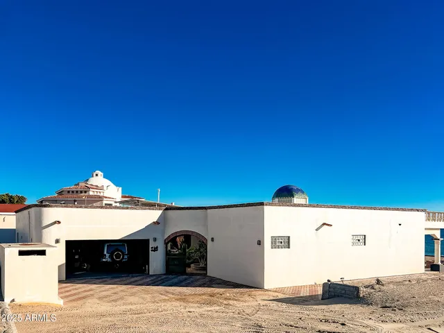 a view of a balcony with an ocean
