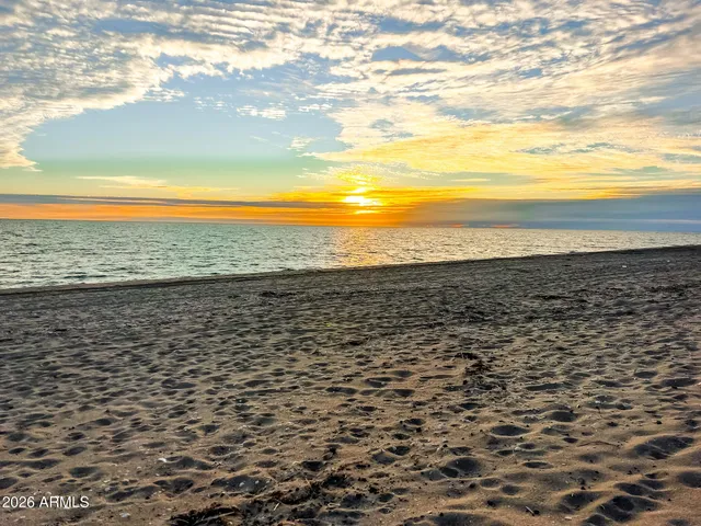 swimming pool view with a outdoor seating space