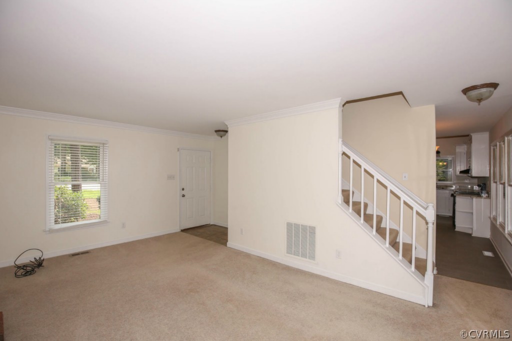 5802 Mill Spring Lane Midlothian, VA 23112 - Photo 3 of 18 Living area is carpeted, view towards front door a