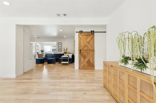 a living room with furniture and a table