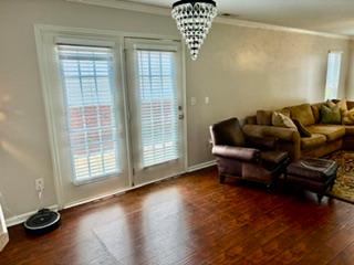 106 Antique Court Pendleton, SC 29670 - Photo 8 of 18 Hardwood floors and a sparkling chandelier enhance this welcoming dining area