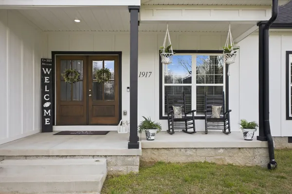 a view of sitting area in front of a house