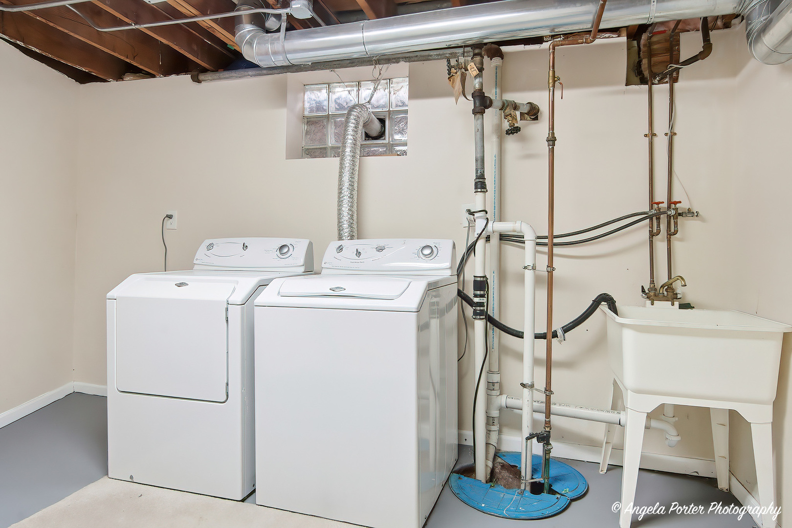 1913 Rancho Lane Des Plaines, IL 60016 - Photo 31 of 36 a utility room with dryer and washer