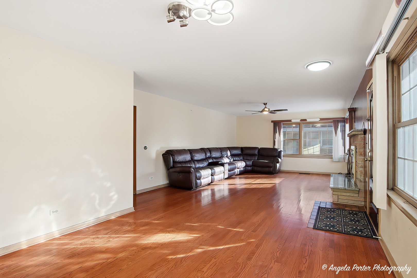 1913 Rancho Lane Des Plaines, IL 60016 - Photo 6 of 36 a living room with furniture and a wooden floor