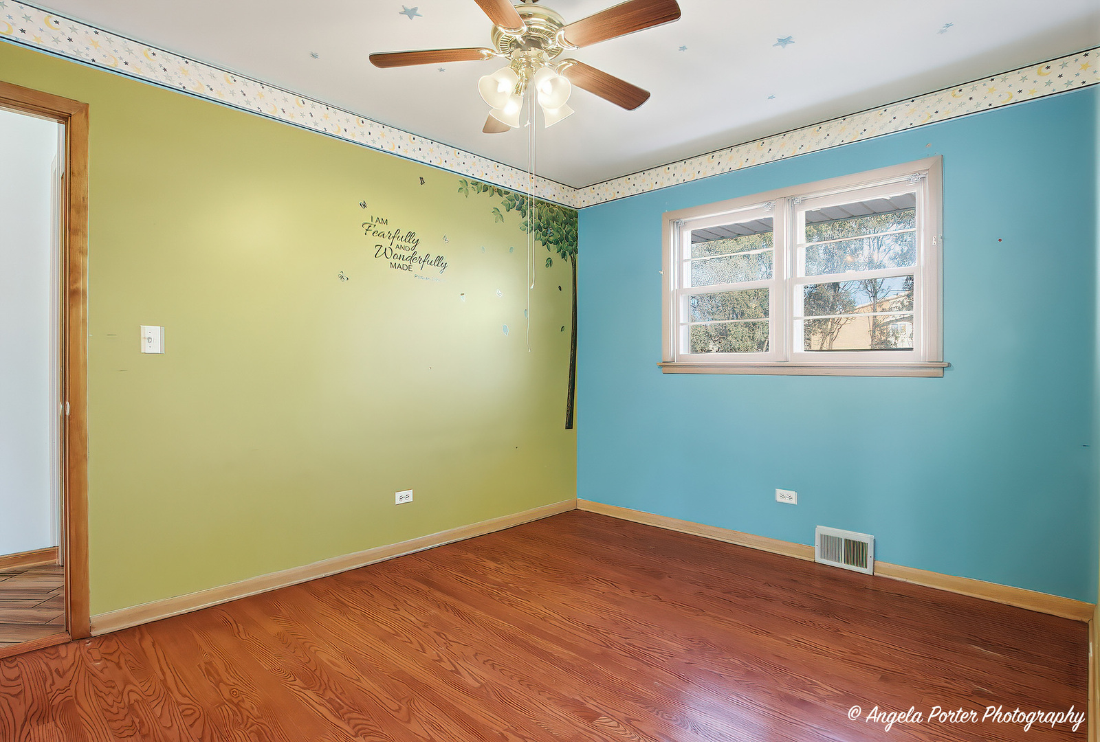 1913 Rancho Lane Des Plaines, IL 60016 - Photo 10 of 36 a view of a big room with wooden floor and windows