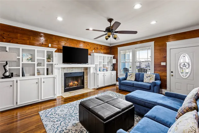 a kitchen with stainless steel appliances granite countertop a sink and a refrigerator