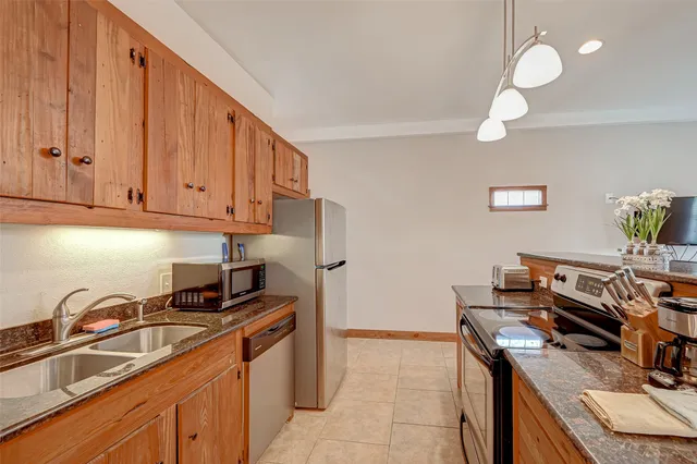 a bathroom with a toilet and a mirror