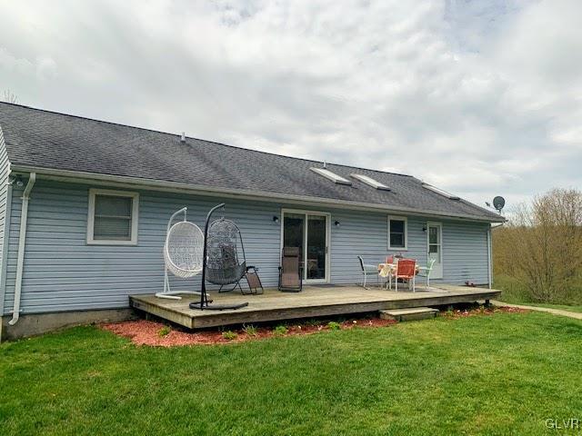 291 Sunset Road Milan, PA 18831 - Photo 29 of 38 a front view of house with outdoor seating and barbeque oven