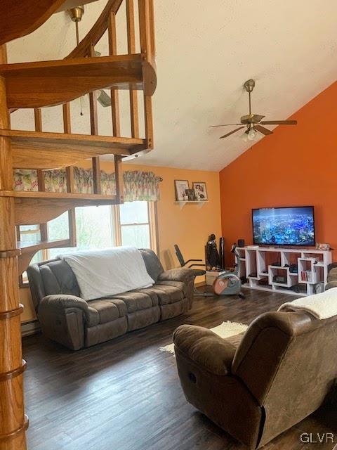 291 Sunset Road Milan, PA 18831 - Photo 5 of 38 a living room with furniture a fireplace and a floor to ceiling window