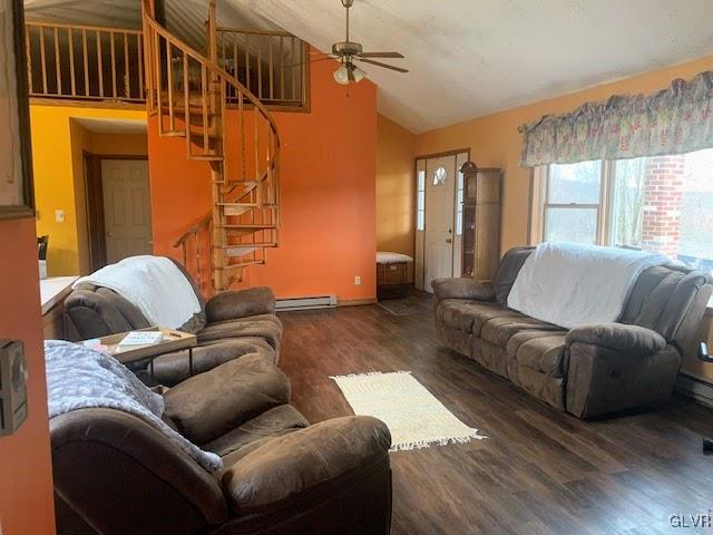 291 Sunset Road Milan, PA 18831 - Photo 7 of 38 a living room with furniture a ceiling fan and a window