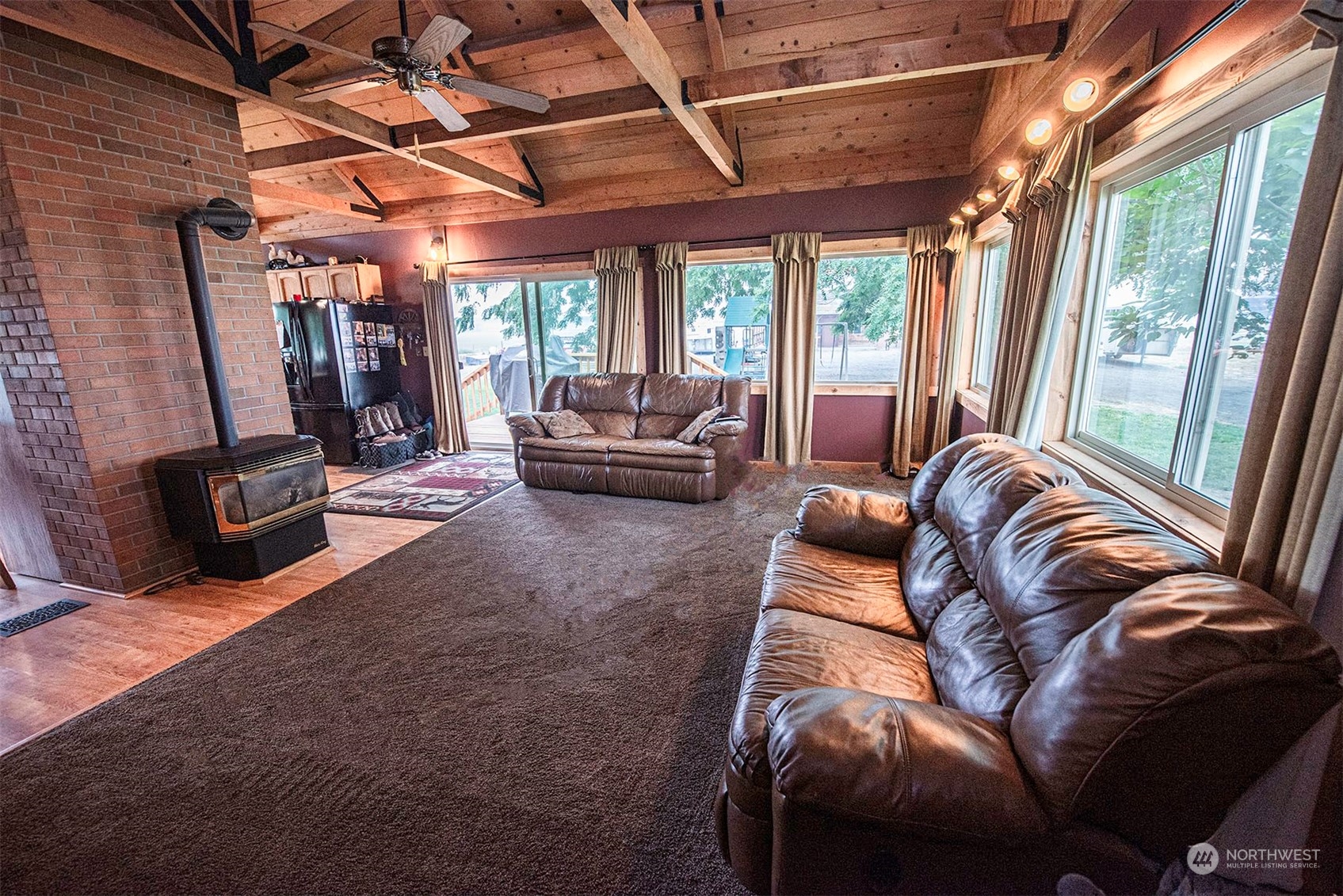 1666 Cummins Road Touchet, WA 99360 - Photo 5 of 35 a living room with furniture and a floor to ceiling window