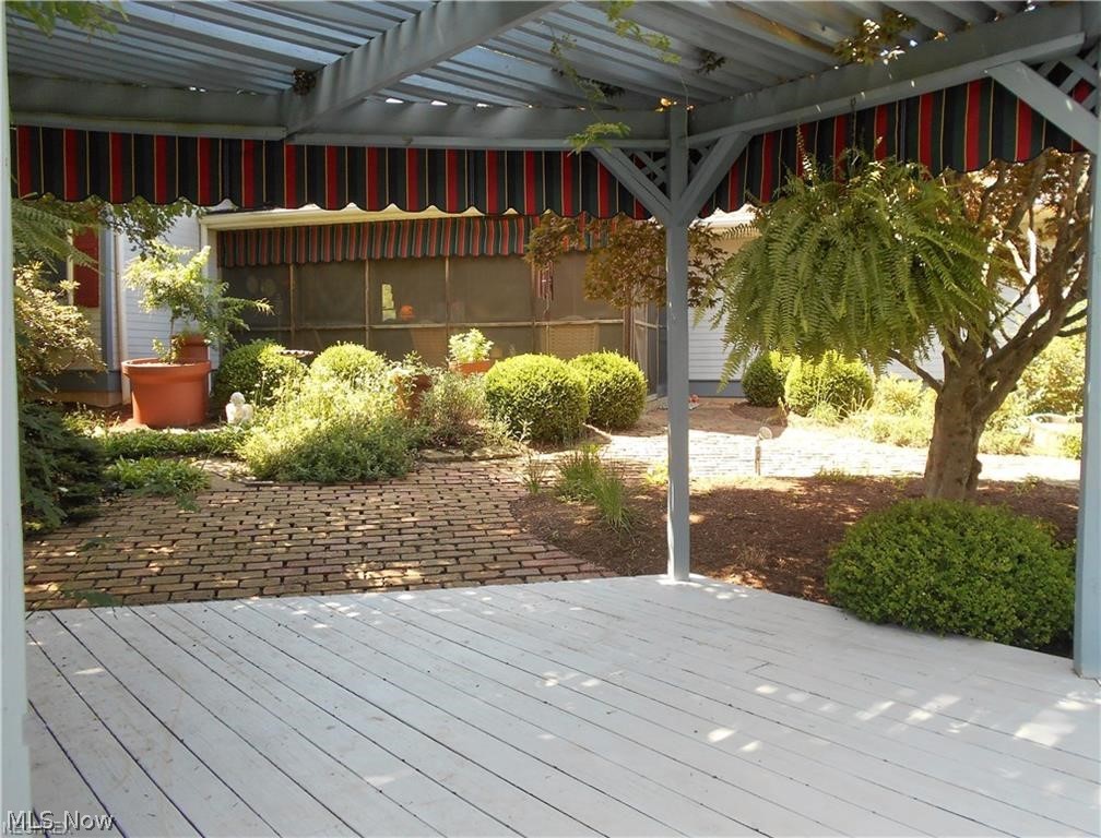 287 Holdren Road Little Hocking, OH 45742 - Photo 6 of 35 View of the screened in porch from the back covered deck