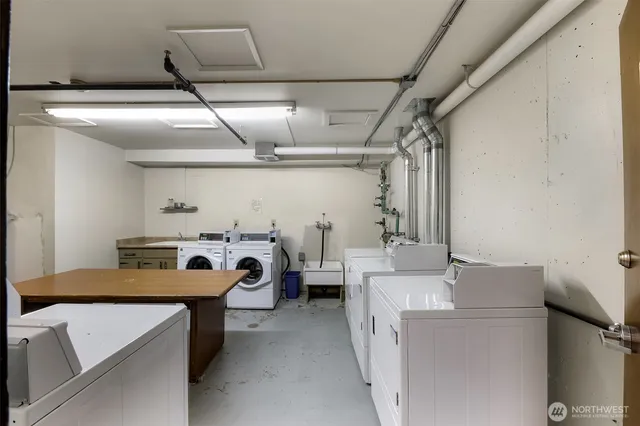 a utility room with dryer and washer