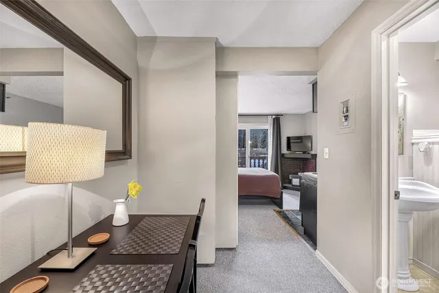 a living room with furniture and a table